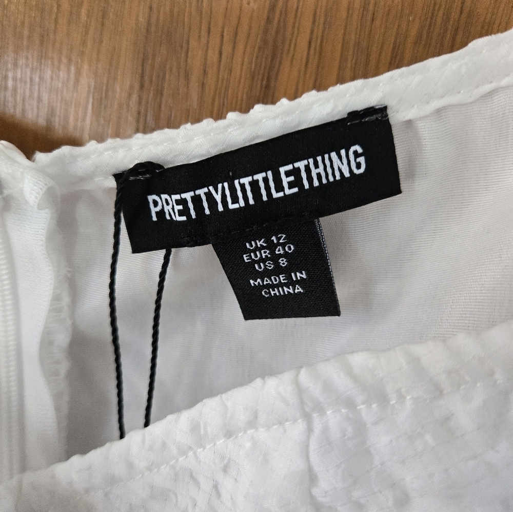 NWT Pretty Little Thing, White Puff Sleeve Dress Size 8. - Picture 2 of 5